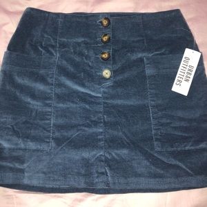 blue/navy blue suede skirt with two big pockets.